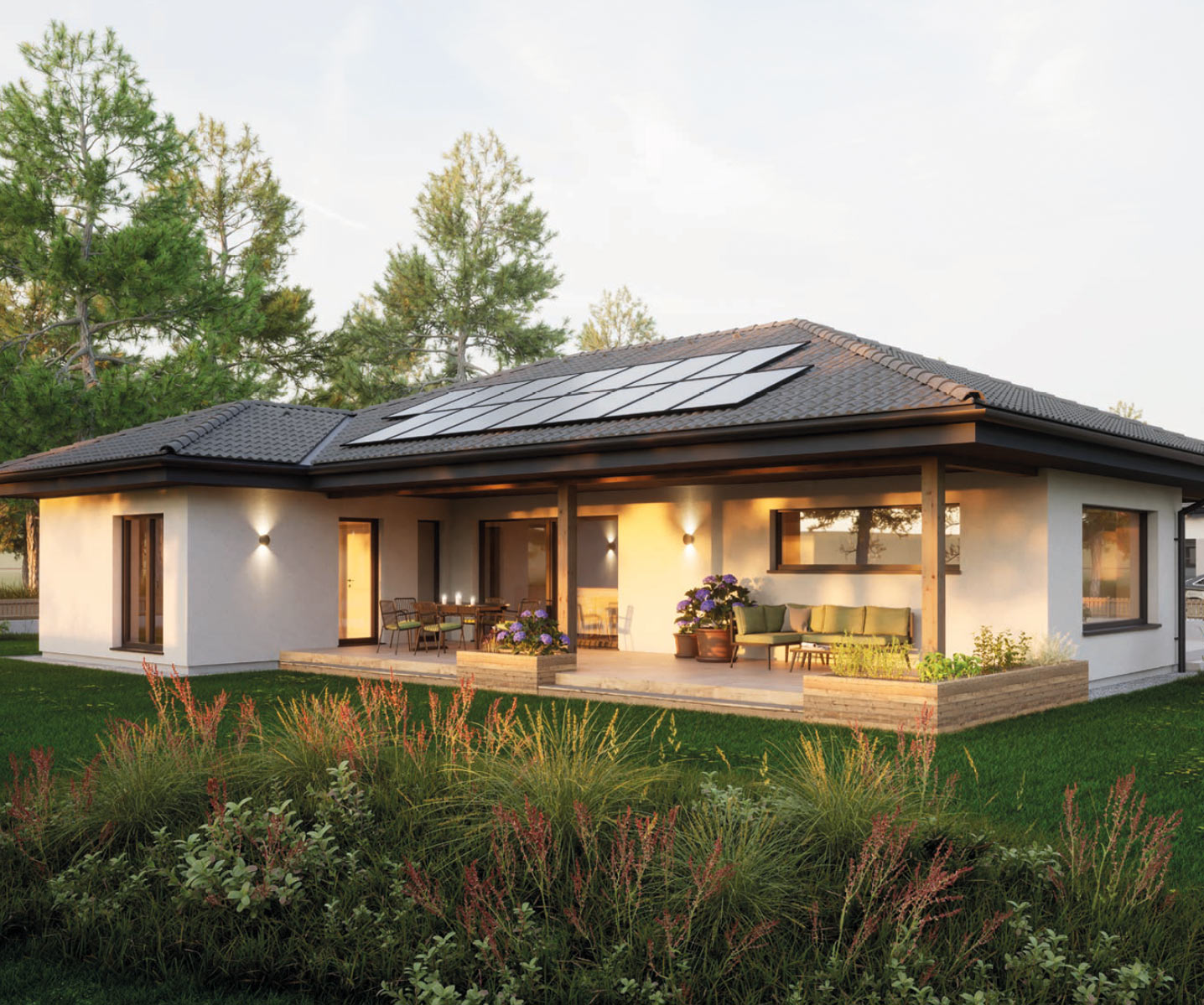 Bungalow mit Photovoltaikanlage und Terrasse bei Abendsonne