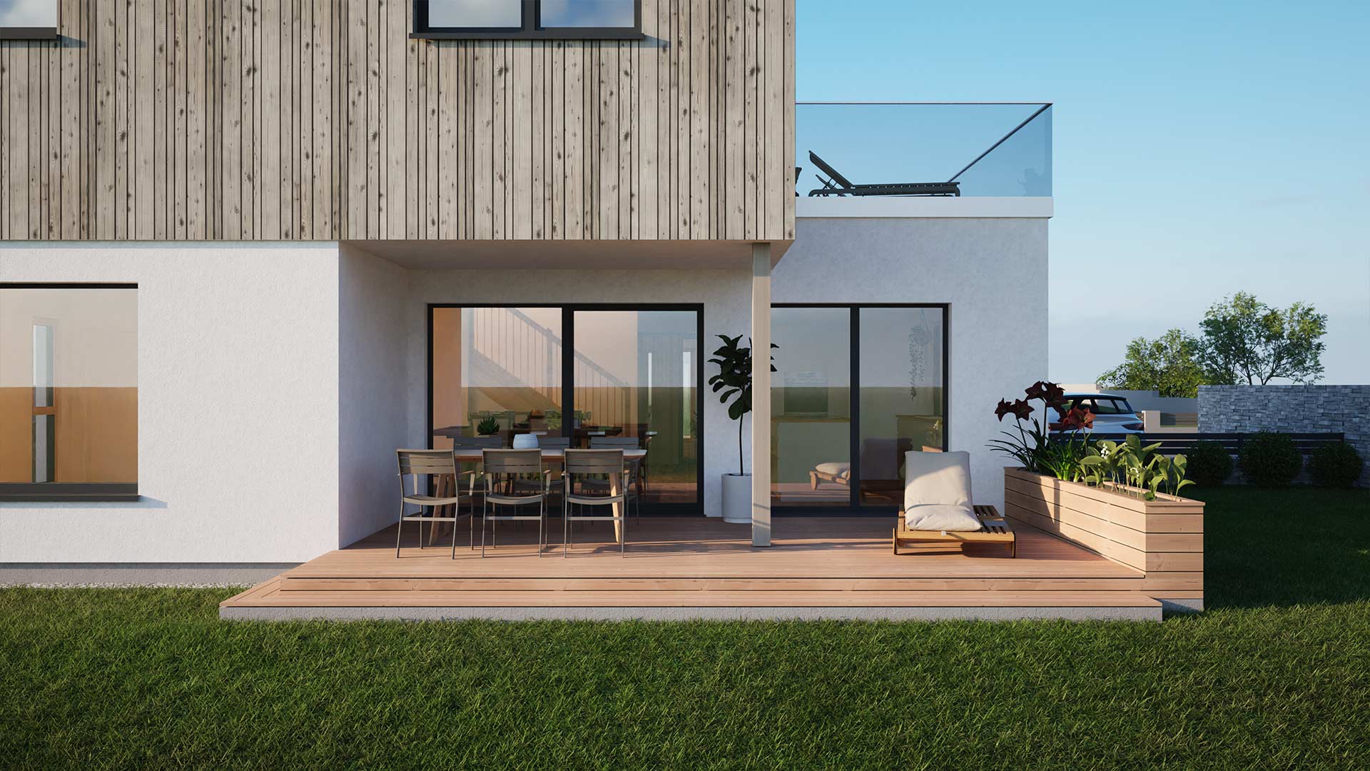 Detailansicht der Terrasse einer modernen Stadtvilla mit Esstisch, Stühlen, Liege und Hochbeet mit Blumen und Pflanzen.