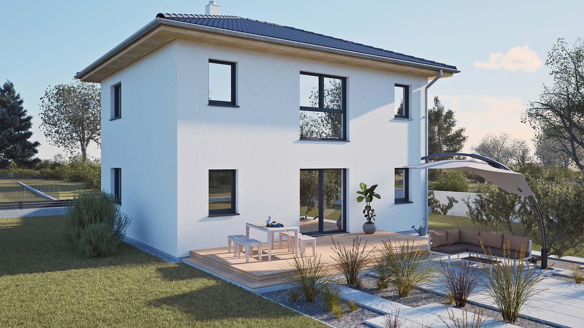 Zweistöckiges Fertighaus von Hartl Haus mit heller Fassade und Sonnenterrasse.