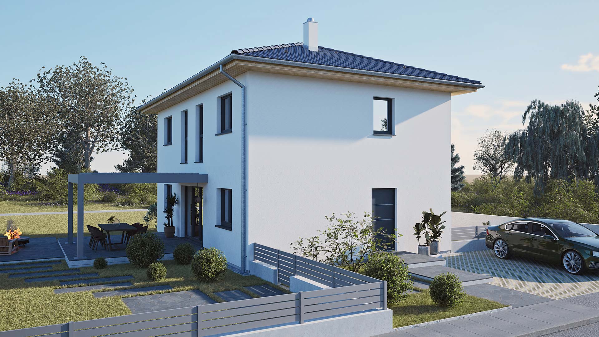 Zweistöckiges Hartl Haus Fertighaus mit Flachdach und überdachter Terrasse im Garten.
